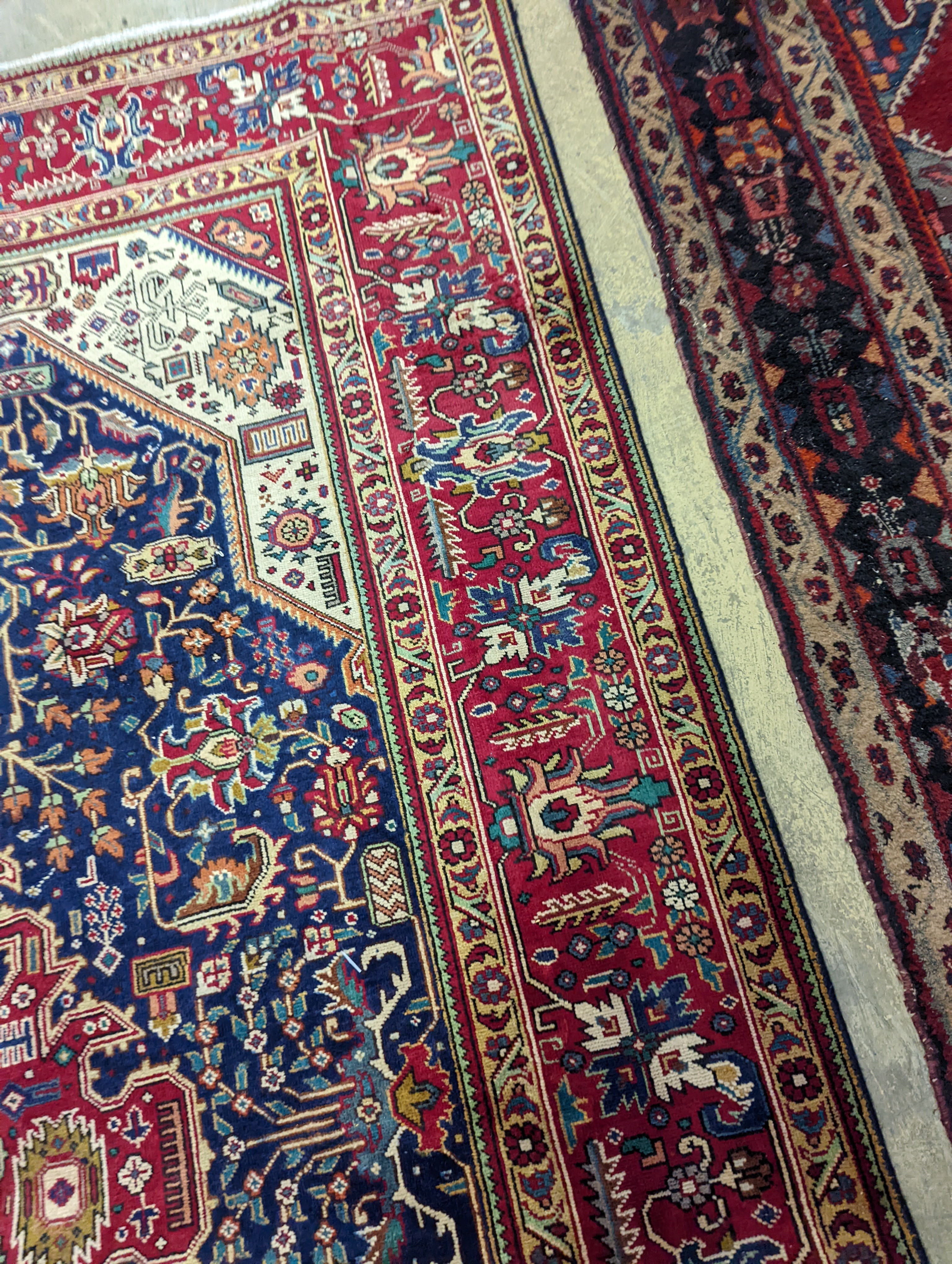 A Tabriz blue ground carpet, 290 x 200cm